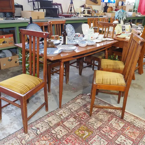 mid century mahogany based and formica top dining table and 6 high back beech dining chairs