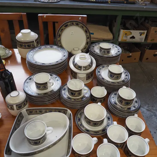 assorted Mikasa Intaglio dinner items; plates, canisters, cups, bowls etc