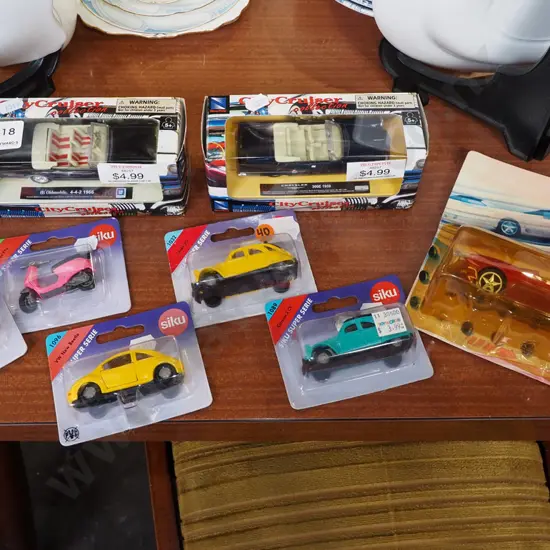 assorted boxed toy vehicles