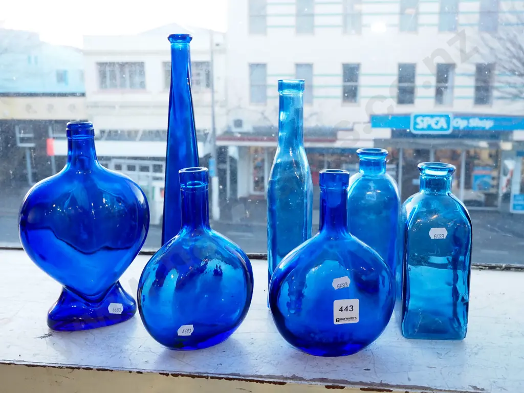 assorted blue glass bottles - tallest H320 Image 1++
