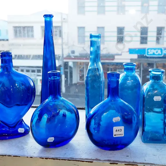 assorted blue glass bottles - tallest H320