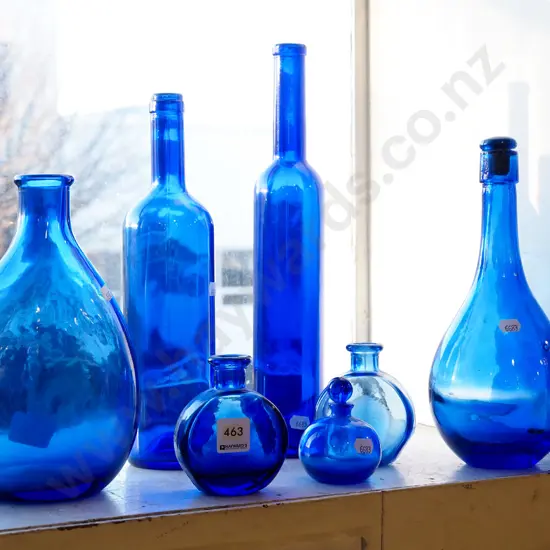 assorted blue glass bottles Tallest H340