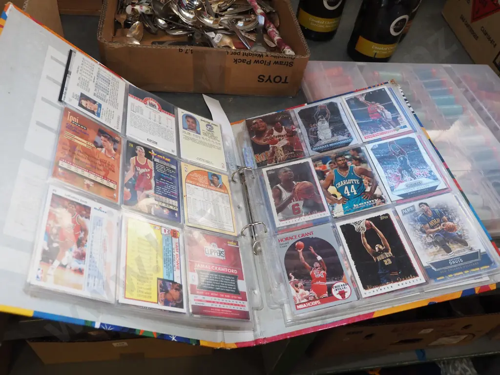 album of basketball collector cards Image 1++