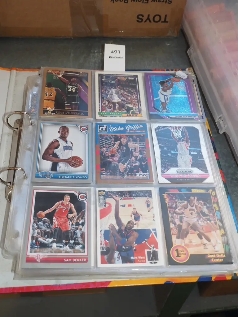 album of basketball collector cards Image 1++