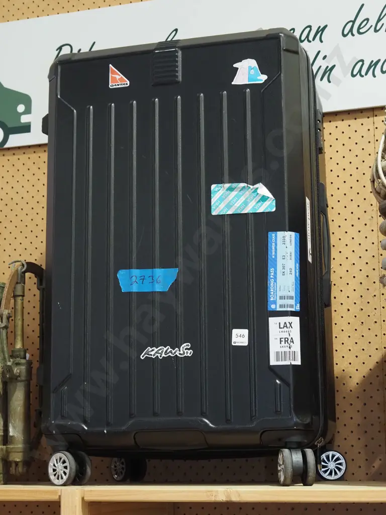 black plastic suitcase on wheels Image 1++