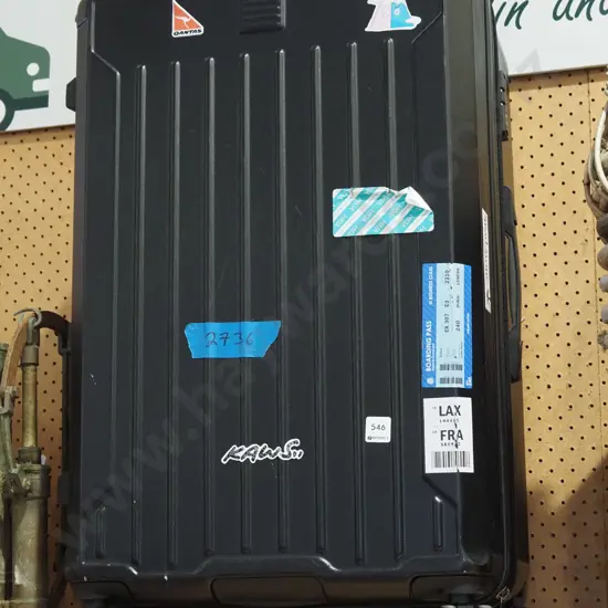 black plastic suitcase on wheels