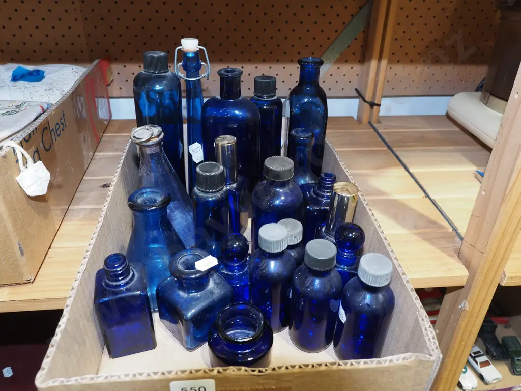 box of blue glass bottles Image 1++