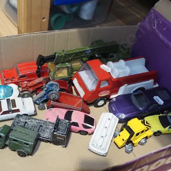 box of toy vehicles