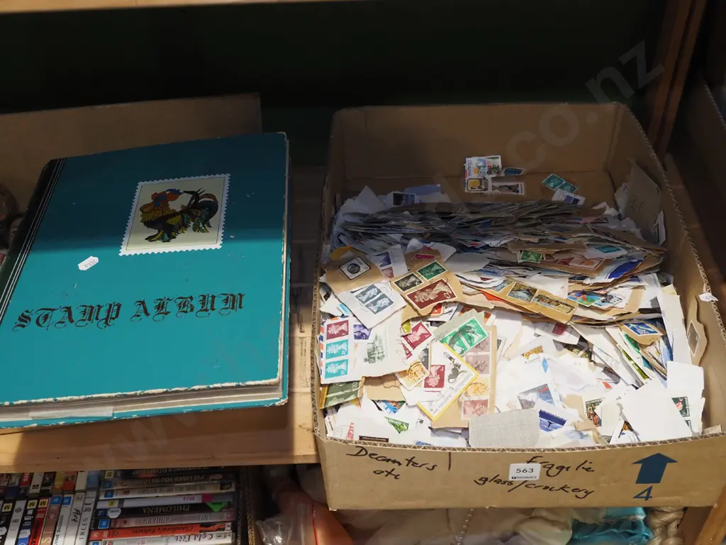 box of stamps, empty stamp album Image 1++