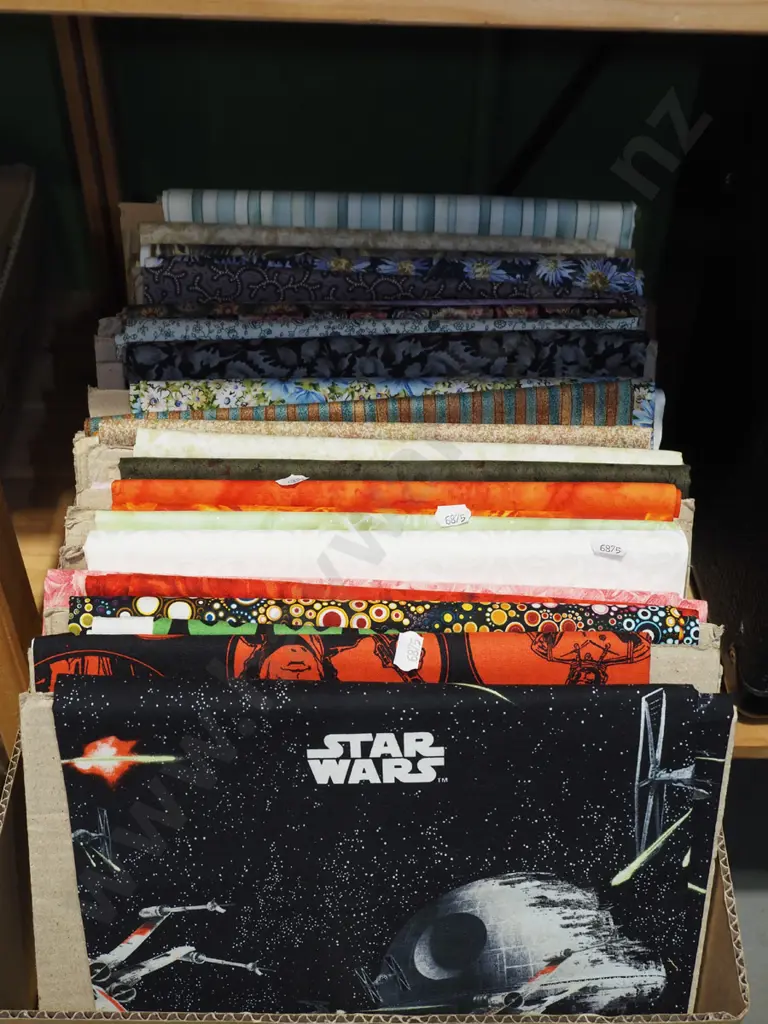 box of fabric pieces Image 1++