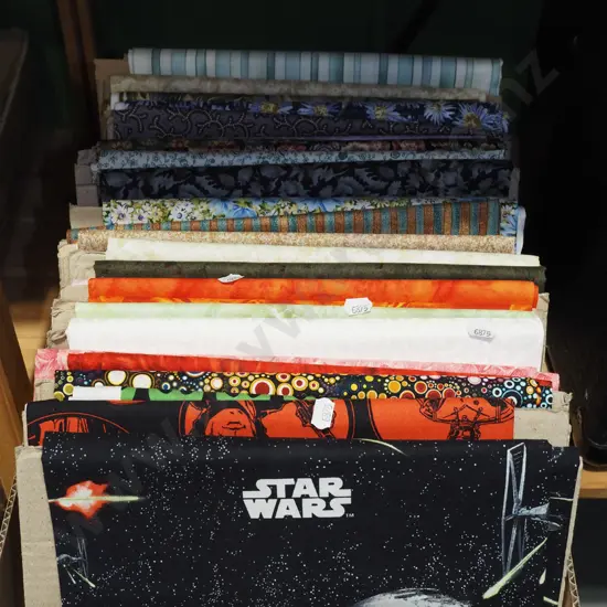box of fabric pieces