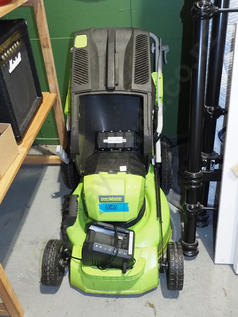 Lawnmaster battery powered lawn with charger and battery Image 1++