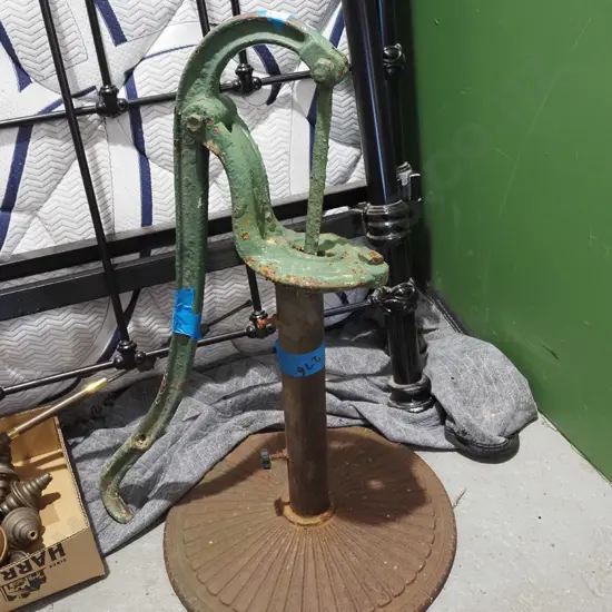 rusty part cowtail pump, umbrella stand