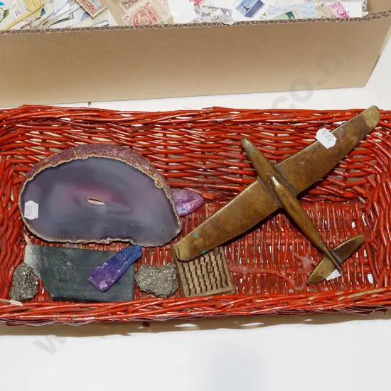 cane basket, homemade brass plane, polished gemstones