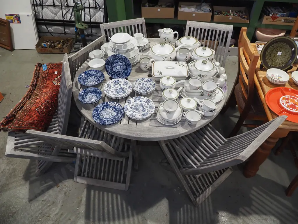 hardwood outdoor drop side gate leg table with 6 matching chairs H720 Extended diam1200 Image 1++