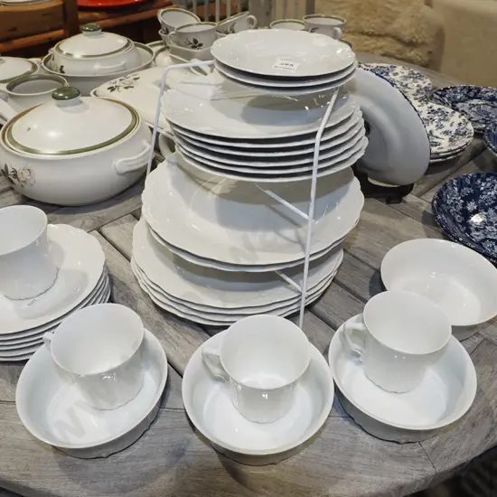German pottery cups, saucers, plates, bowls and stand