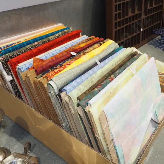 box; various fabric pieces