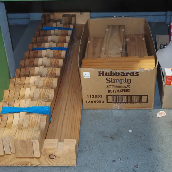 disassembled pine wine rack