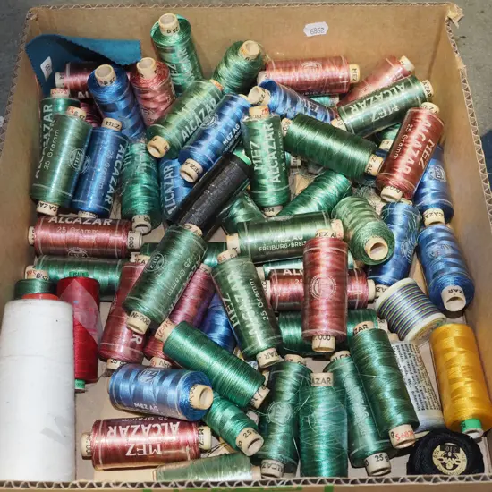box of sewing threads