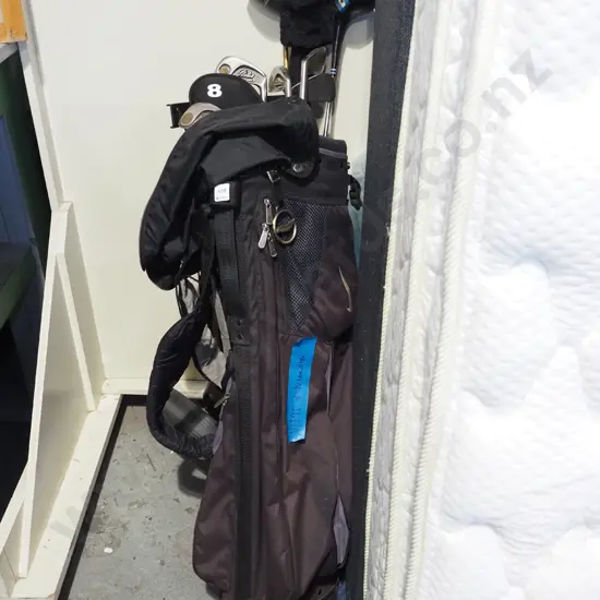 golf clubs and trundler