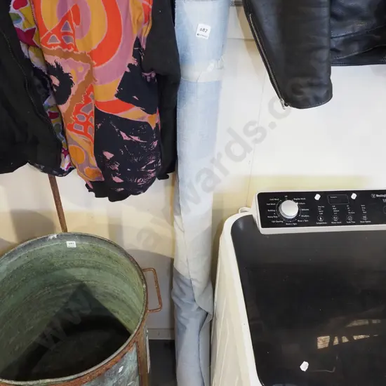 roll of grey upholstery fabric
