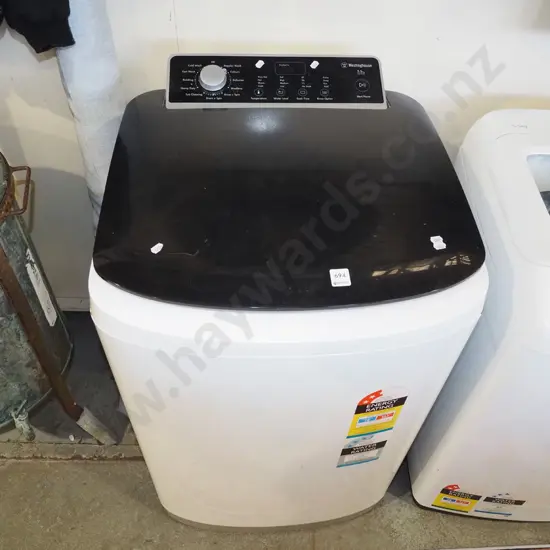 Westinghouse 5.5kg top loader washing machine - needs a clean, some rust to 1 side