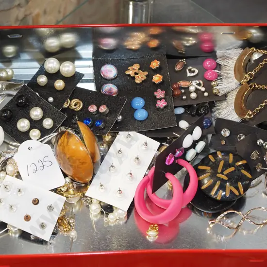 tin of costume jewellery