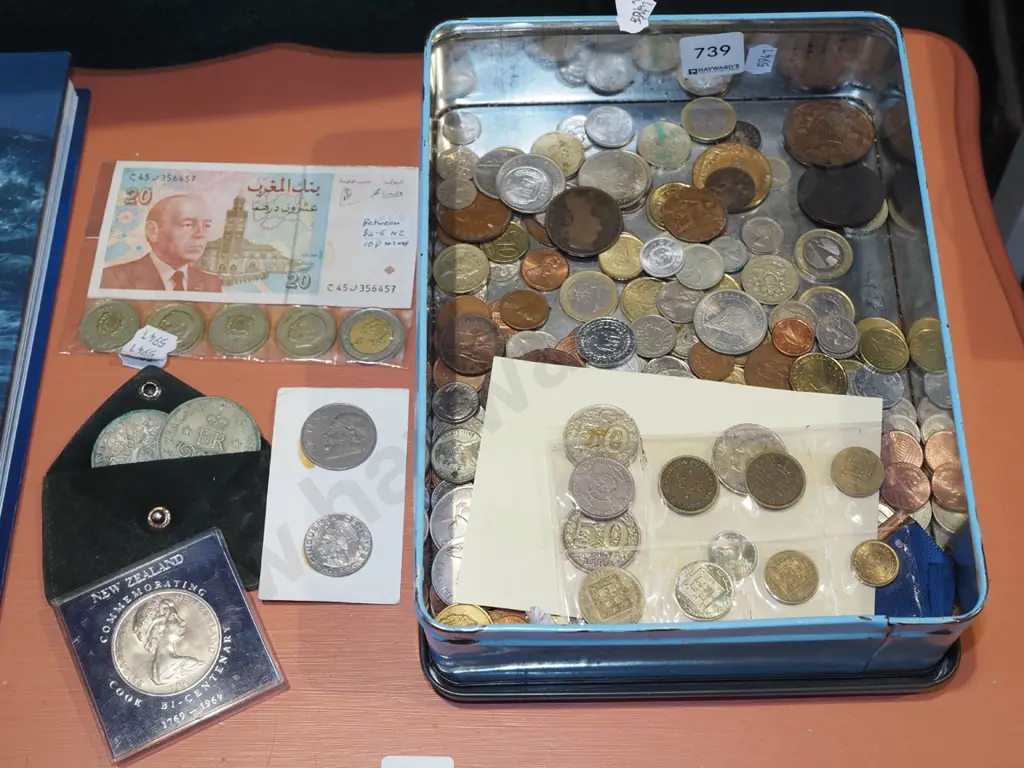 tin of notes and coins Image 1++