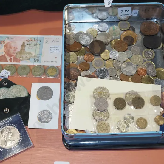 tin of notes and coins