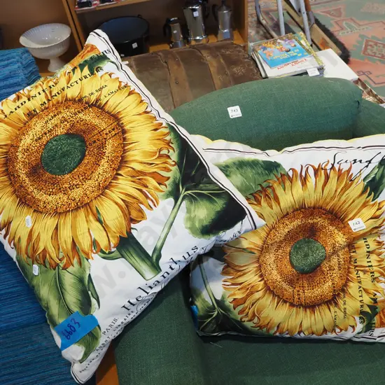 2x sunflower decorated cushions