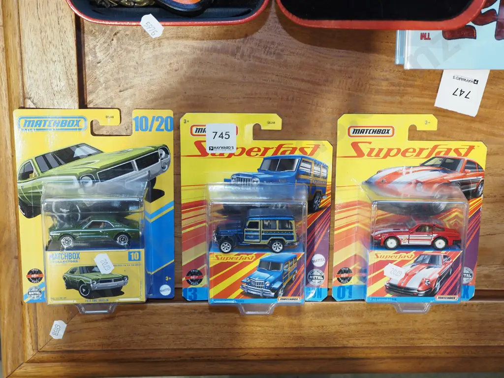 3x as new carded Matchbox vehicles Image 1++