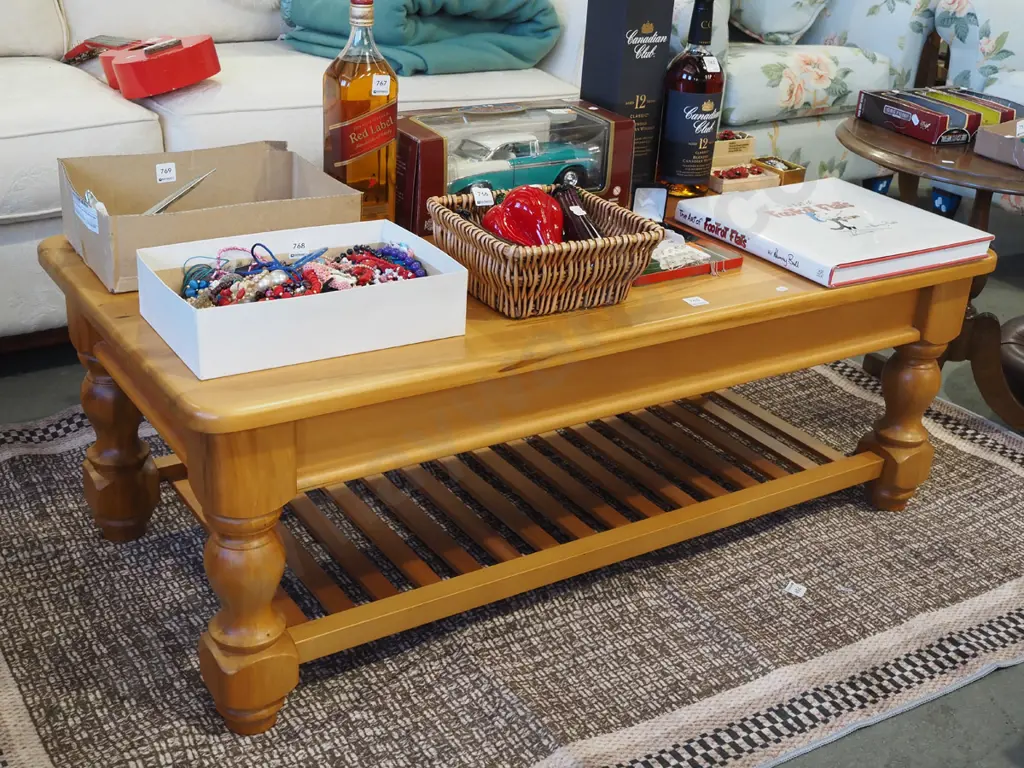solid rimu turned leg coffee table with magazine rack H435 W1200 D595 Image 1++