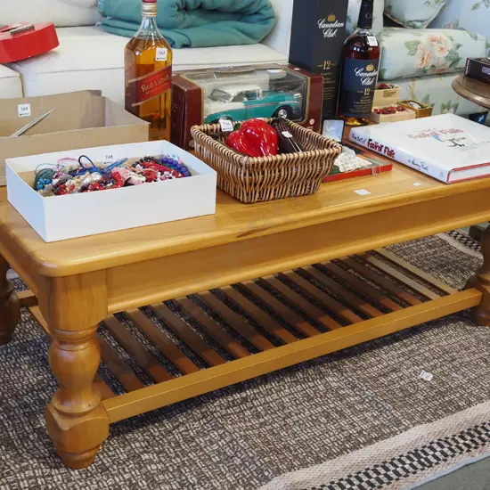 solid rimu turned leg coffee table with magazine rack H435 W1200 D595