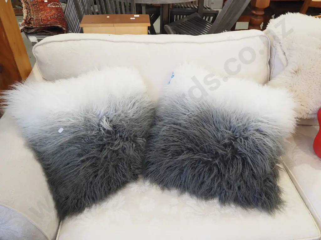 pair of fluffy faux fur cushions Image 1++