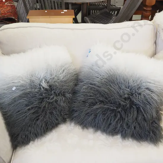 pair of fluffy faux fur cushions