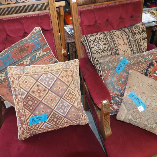 5 needlework and woven cushions