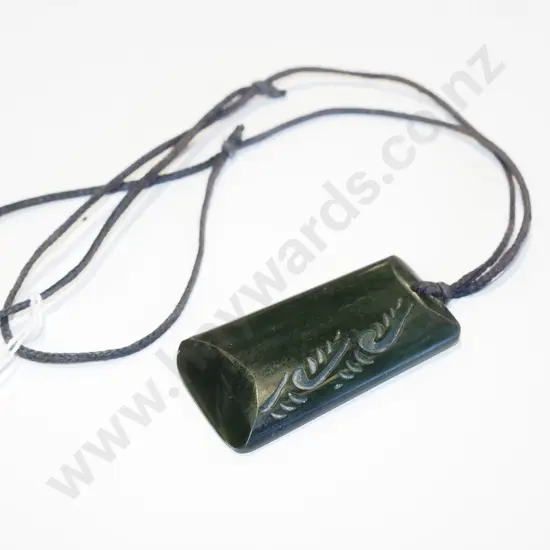 greenstone pendant on cord