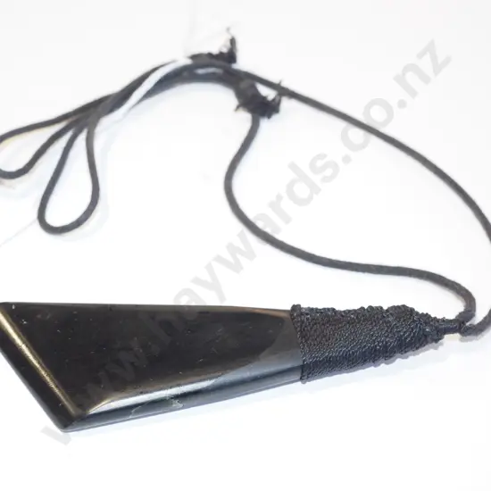 large black stone on cord