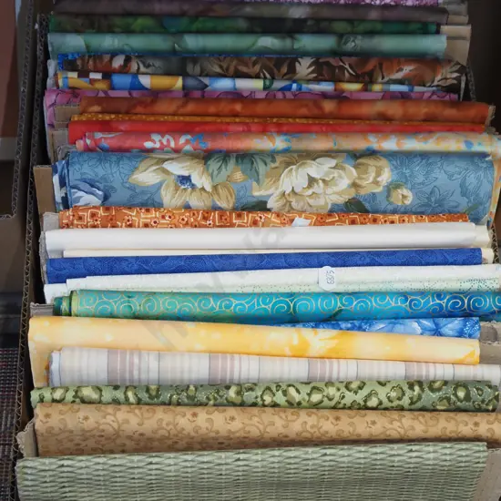box of fabric pieces