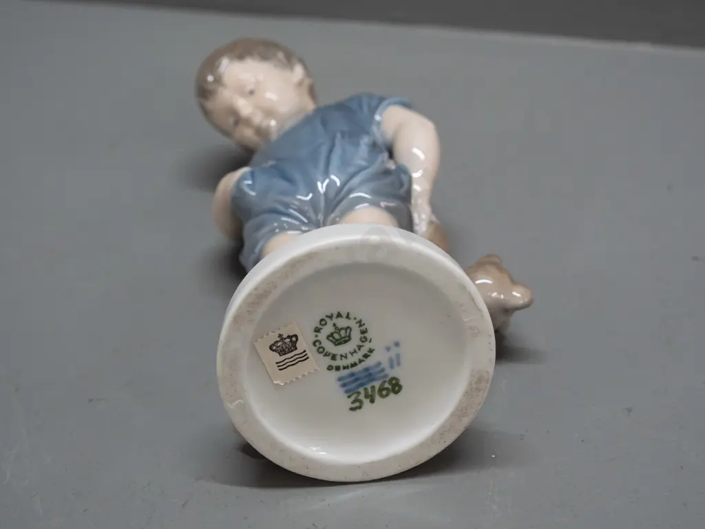 Royal Copenhagen figure - boy with Teddy bear and ball H-190 Image 1++