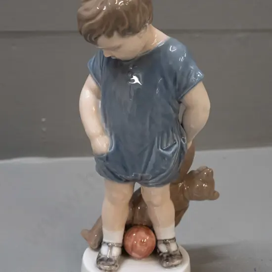 Royal Copenhagen figure - boy with Teddy bear and ball H-190