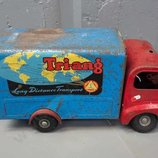 vintage tin toy Triang truck with Lines Bros. Group / Long Distance Transport markings, tyres marked Triang England