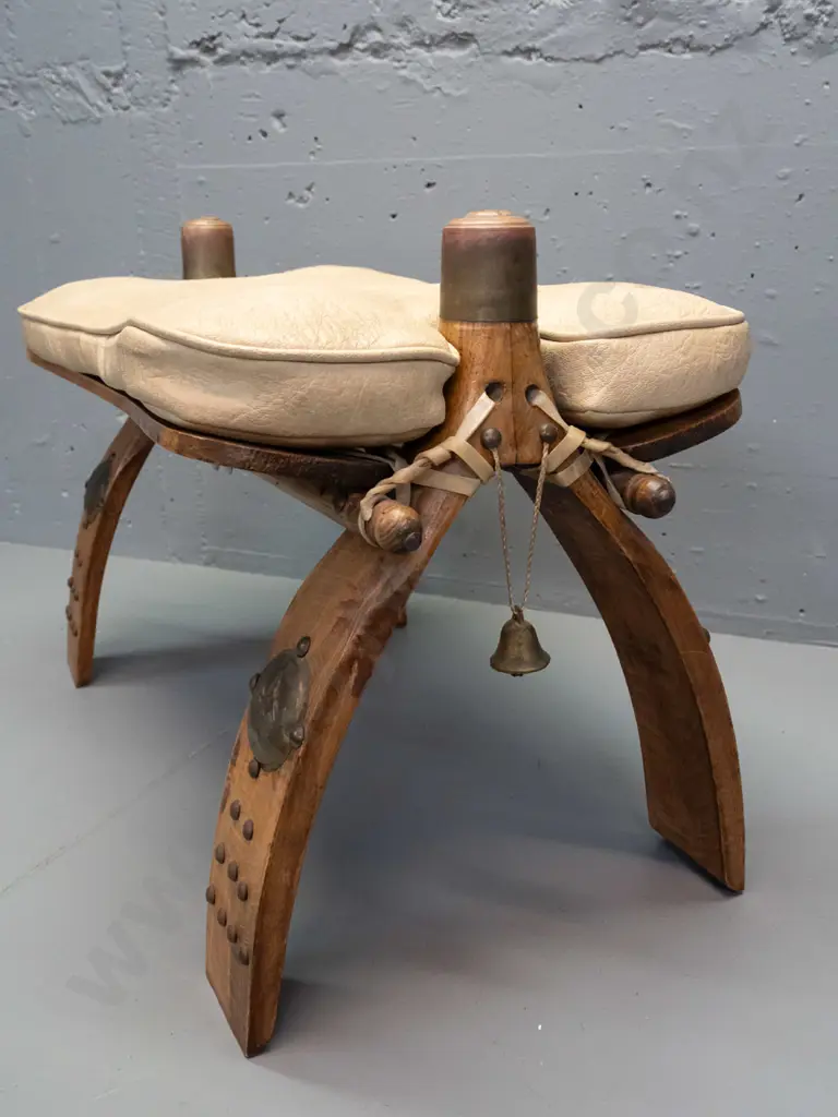 beech camel stool with lift off vinyl squab, Egyptian style applied brass caps and decoration Image 1++