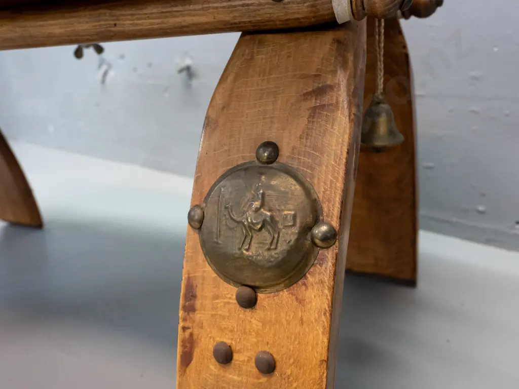 beech camel stool with lift off vinyl squab, Egyptian style applied brass caps and decoration Image 1++