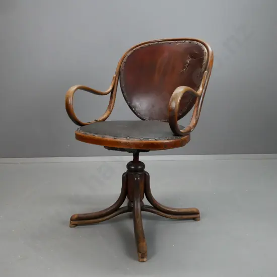 vintage bentwood swivel rise and fall desk chair. Medallion back, sweeping arms, 4 point