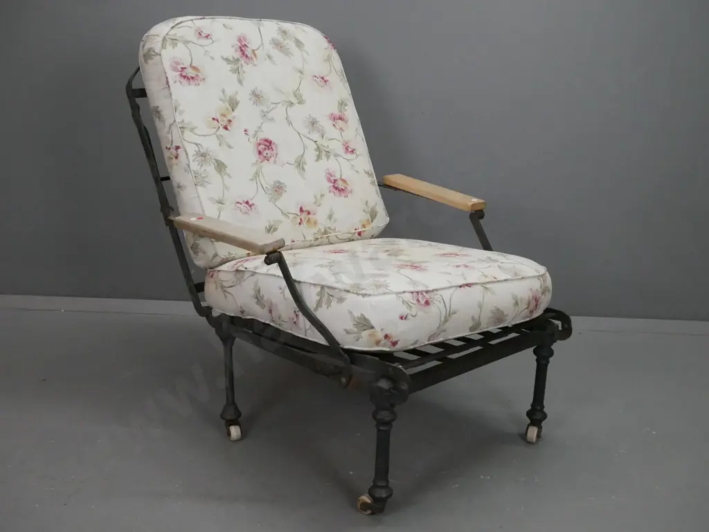 Victorian wrought and cast iron framed chair folding out to narrow bed with beech arms, on white porcelain casters, with Image 1++
