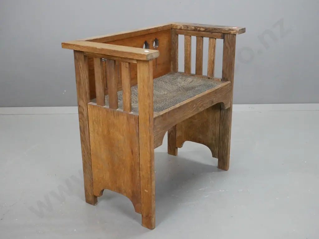 vintage oak arts & crafts style seat with slatted sides, pierced back, storage under lift-out woven seagrass seat - Image 1++