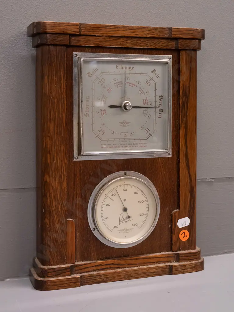 oak-cased wall barometer-thermometer with silver faces - marked SB / Smiths British Made - minor corrosion around chrome Image 1++