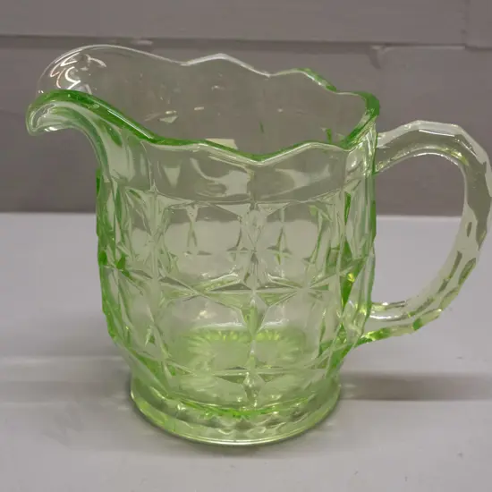 moulded uranium glass jug H-150 W-200 handle to spout
