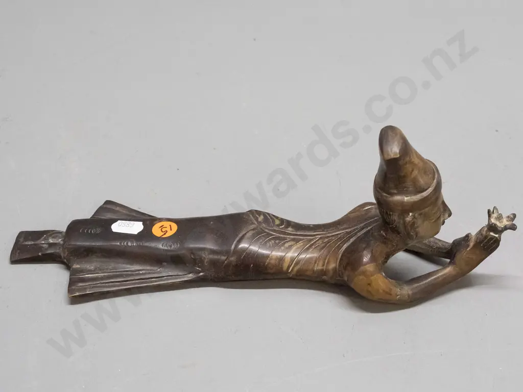 cast brass or bronze female figure stretched out holding lotus flower - uneven patination H-90 L-280 Image 1++